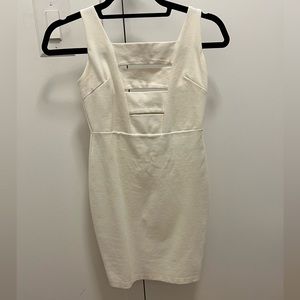 Adorable white dress with slits in the middle! Perfect condition no flaws!